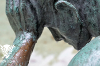 Embracing Imperfection Touchpoint; detail image old of statue thinking