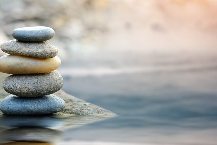 Balance in Recovery Retreat; photo of a rock pile precariously balancing