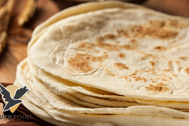 Touchpoint: Give us this day our daily bread. Image is photo of a plate of tortillas.